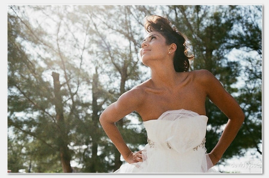 small fishing-village character — colorful boats, weathered docks, quiet streets | Caribbean coast — turquoise water with the brightest sand-water contrast in the region | reef just offshore — the snorkeling-ready water lies behind the camera for ocean ceremony frames