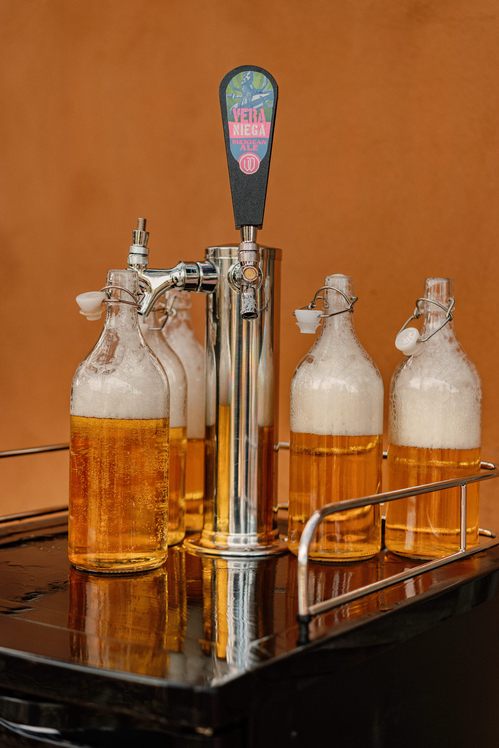 A bottle of Vera Niega — the Wendlandt beer brewed by Eugenio Romero in Ensenada — at Denise and Alfredo's Casa de Piedra wedding