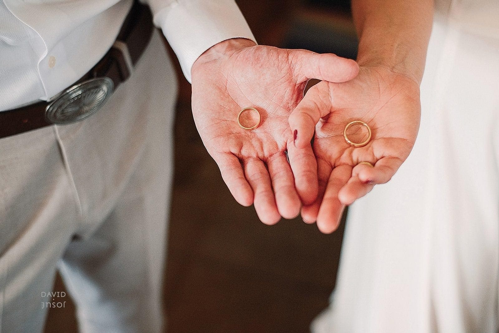 Wedding rings resting on handwritten vows — elopement at Villa del Valle, Valle de Guadalupe