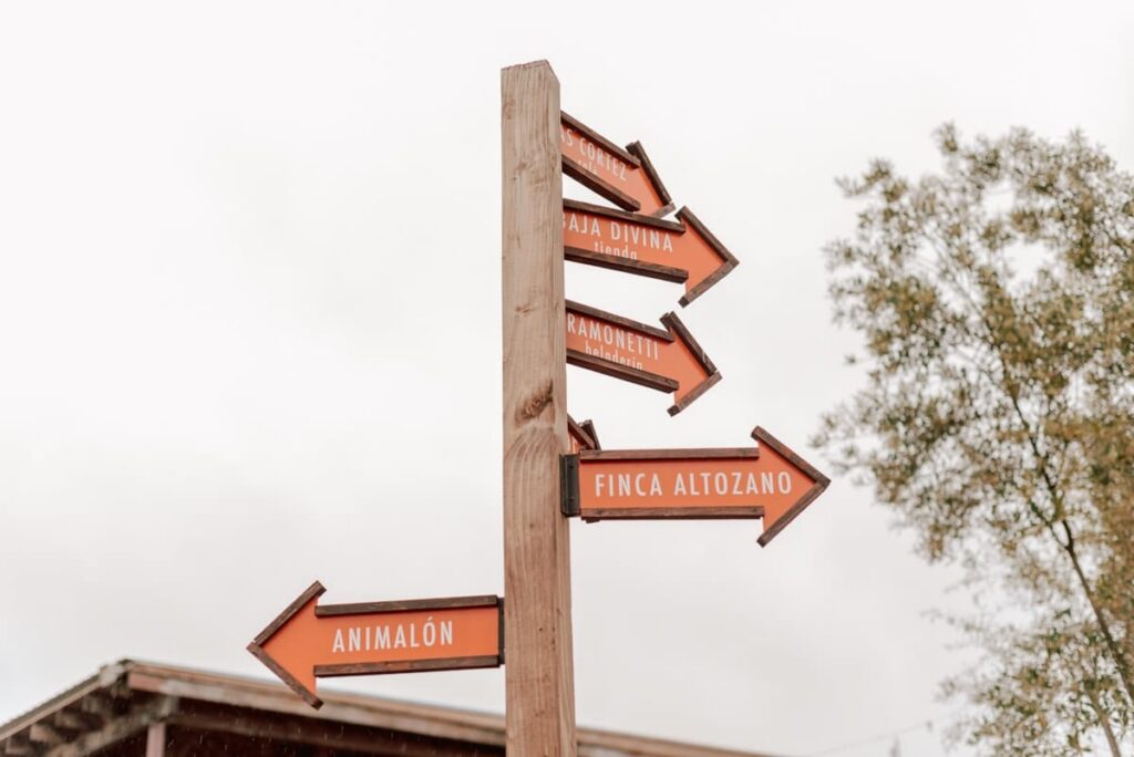 Finca Altozano — open-air restaurant and event property in Valle de Guadalupe wine country | the property is known for open-fire dining and architectural elements made from reclaimed materials | couples search 'finca altozano valle de guadalupe' when planning a wedding or rehearsal dinner here