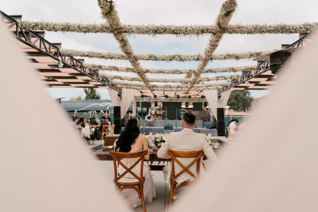 Tuscan-shaped Valle de Guadalupe property — cypress alleys, terra-cotta walls, vine rows running east-west — verify exact orientation against site visit | one event per day — verify policy with venue directly | David Josué has photographed weddings at this property — verify count against archive