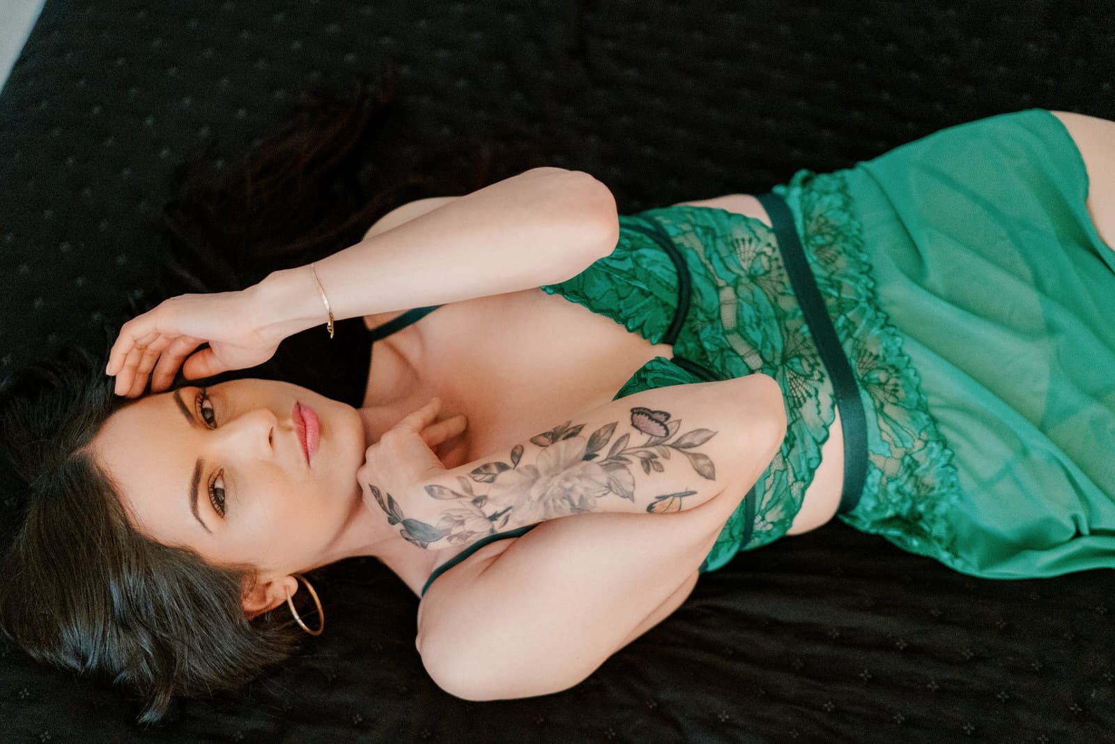 lingerie for boudoir is about fabric and tone, not fashion trend | the photograph reads the texture, the drape, and how the fabric catches the room's light | David Josué brings the same wedding-day instinct to boudoir — quiet, calm, no performing for the camera