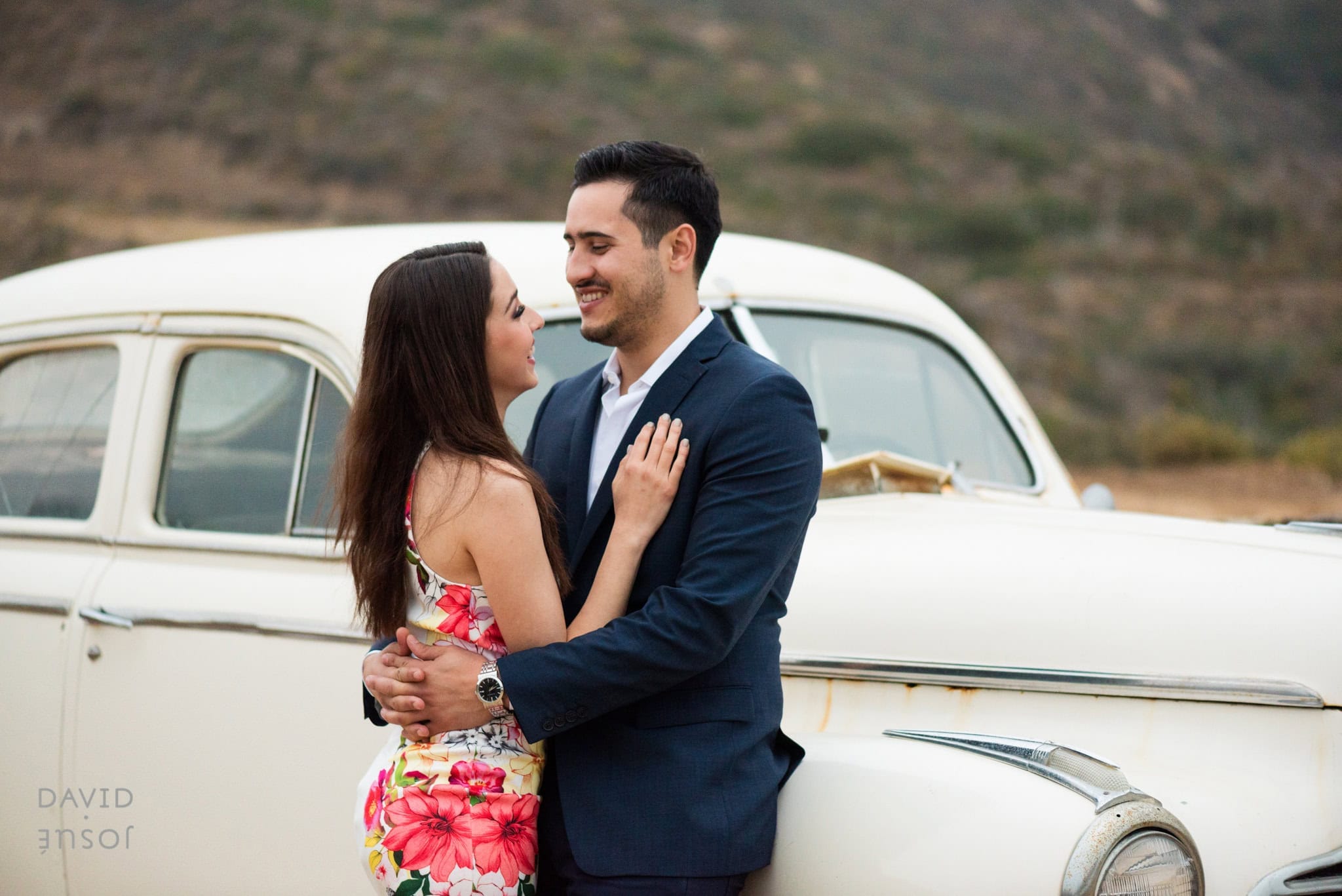 morning — soft, indirect light if getting-ready happens on property | ceremony — cliff-edge positioning gives broad open backdrop | couple portraits at the final golden hour — vineyard side for receding lines, cliff-edge side for open sky