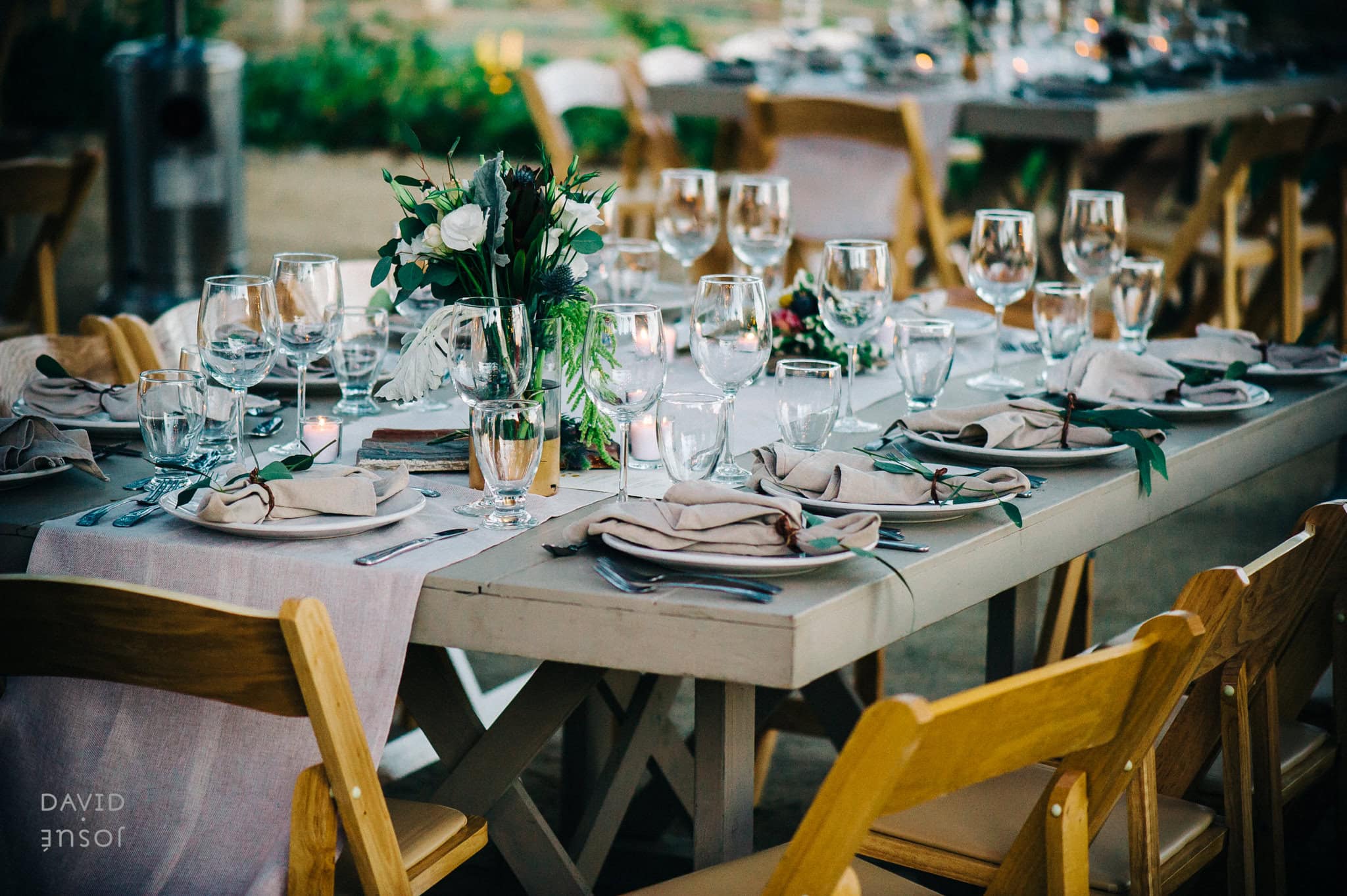open-air dining geometry gives the camera natural composition options | vineyard surroundings deliver receding-line geometry during golden hour | BRUMA's modern minimalist architecture provides clean rectilinear backdrops