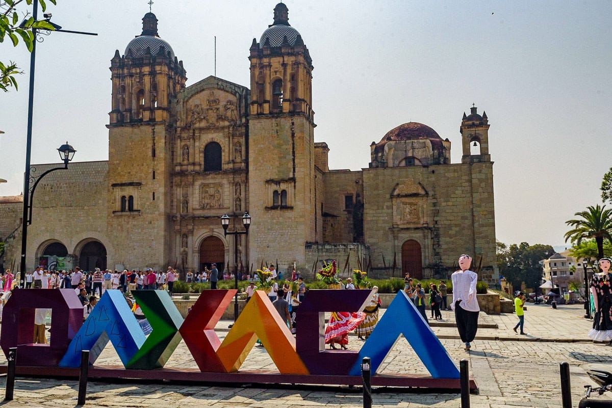 Santo Domingo de Guzmán — colonial church and former monastery complex in central Oaxaca de Juárez | interior gold-leaf altarpieces are one of the most ornate religious spaces in Mexico | couples search 'santo domingo oaxaca' when planning a ceremony at the church or photographing the facade